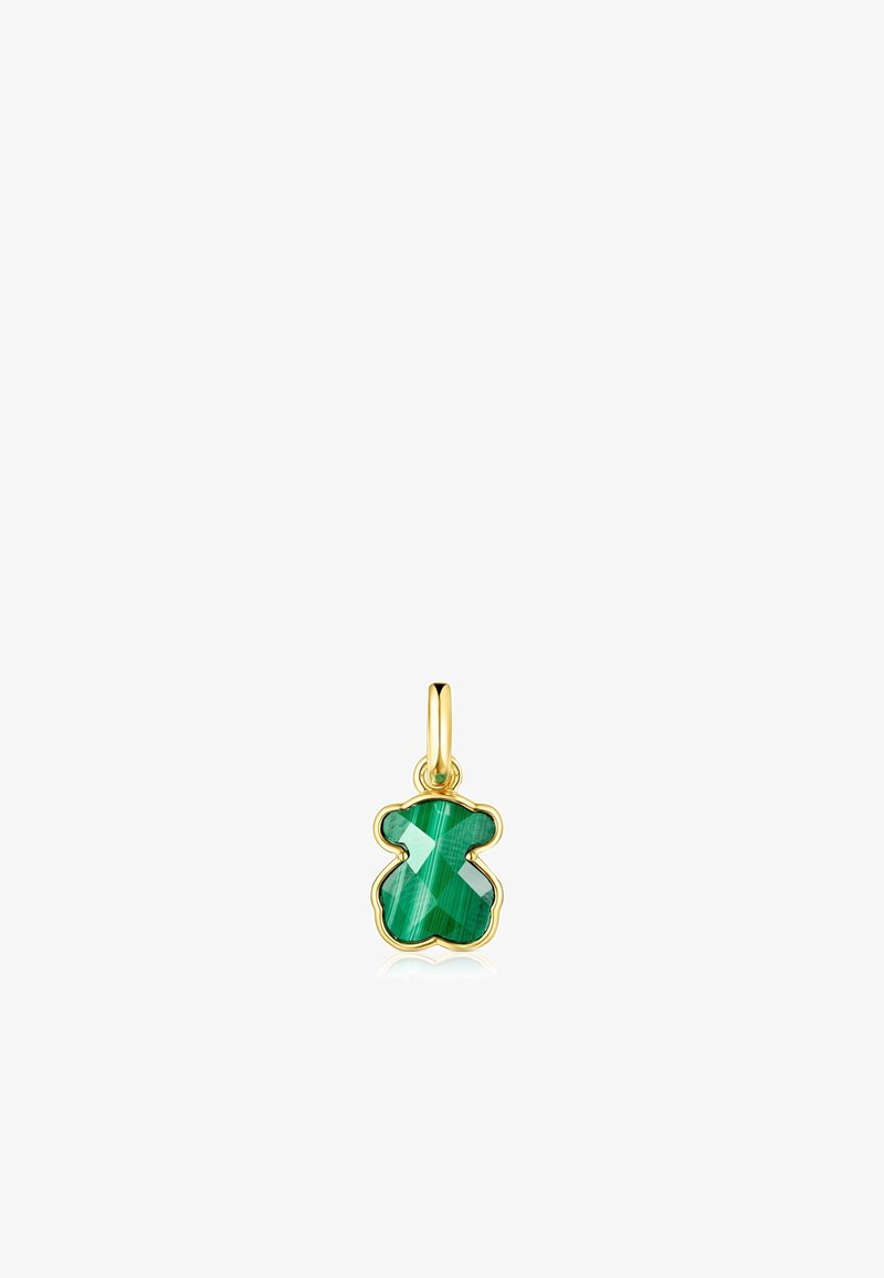 Pendentif en forme d'ours, en pierre précieuse verte à facettes polies et monté dans un cadre en or, avec une boucle pour l'attacher à un collier.