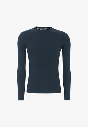 Långärmad marinblå topp i ribbat tyg med rund halsringning. Har en figurnära design och en mjuk textur.