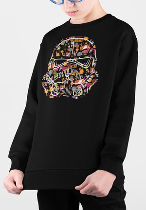 Felpa nera con un grafico colorato del casco di uno stormtrooper realizzato con varie forme e icone, con polsini e vita a coste.