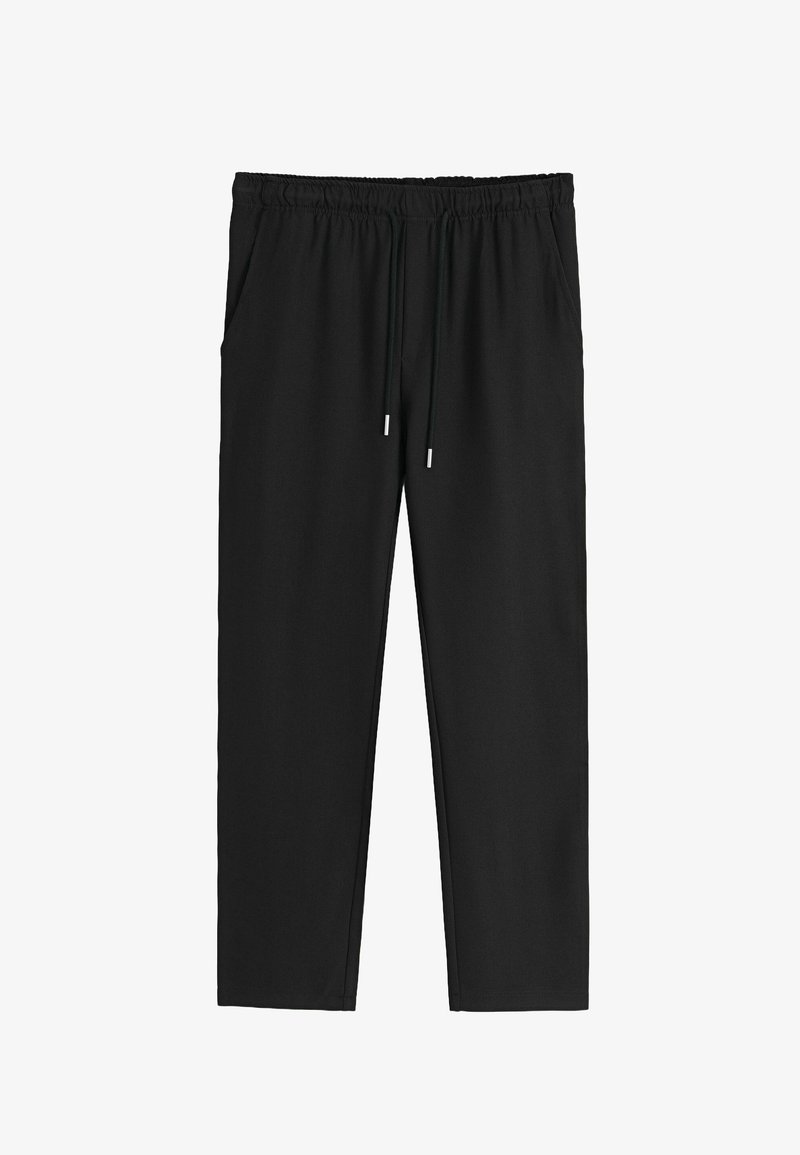 Pantalons noirs à taille élastique avec poches latérales et cordons de serrage à l'avant, coupe droite, sans logos ni motifs visibles.