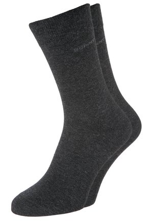 Graue Baumwollsocken mit einem gerippten Design, mittellang, mit einer glatten Textur und dezentem Branding nahe dem Bündchen.