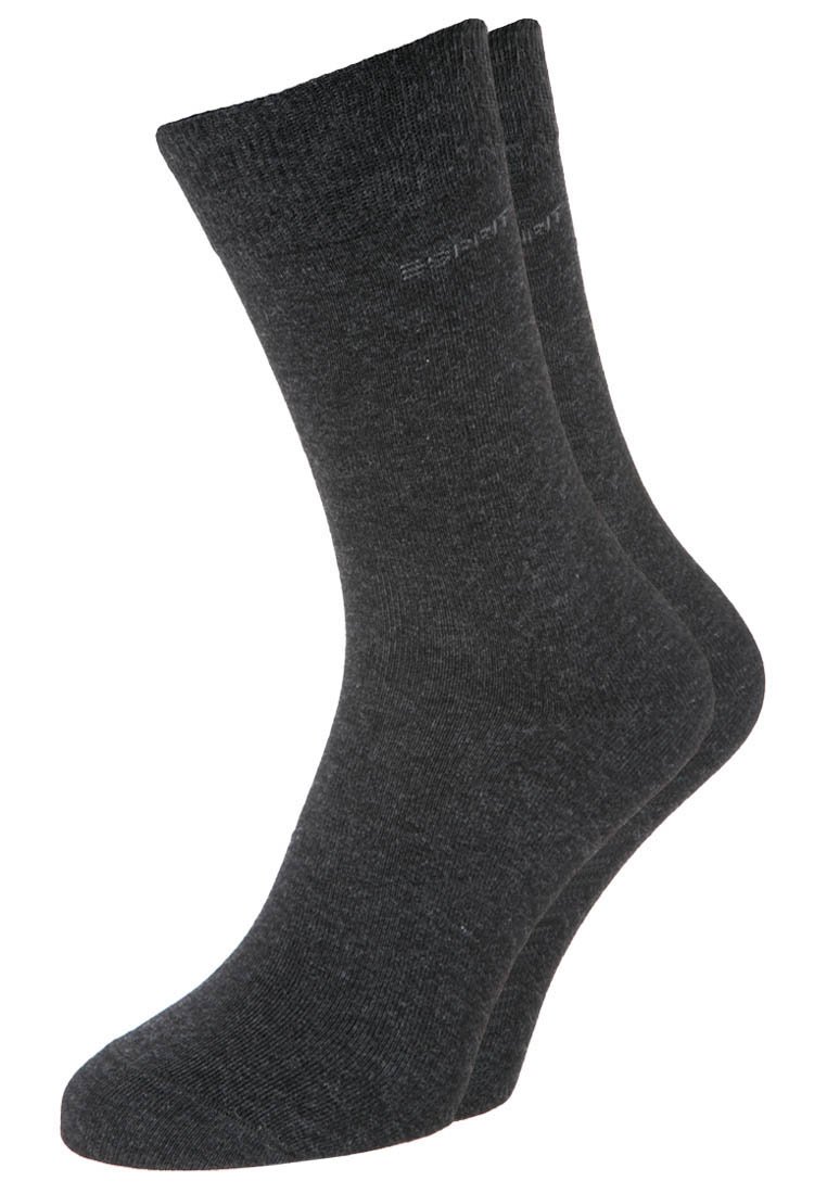 Graue Baumwollsocken mit einem gerippten Design, mittellang, mit einer glatten Textur und dezentem Branding nahe dem Bündchen.