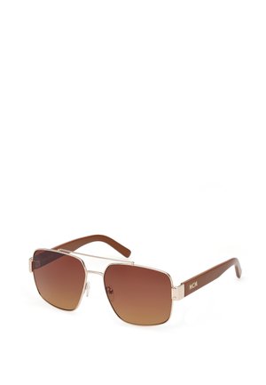 Brown gradient sunglasses with a silver metal frame, featuring a distinctive angular shape and brown arms inscribed with "MCM."