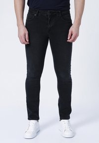 Černé úzké džíny z denimu, s pěti kapsami, zapínáním na knoflík a zip, s jemným vyblednutím a mírným strečem.