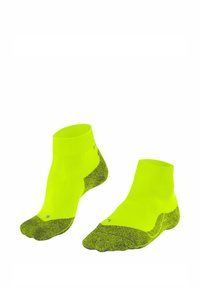Helle neon-gelbe, niedrig geschnittene Socken mit einer strukturierten, dunkelgrauen Ferse und Spitze. Sie verfügen über einen gerippten Bund für eine enganliegende Passform.