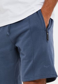 Threadbare Träningsbyxor - denim blue