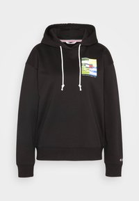 Felpa nera con cappuccio caratterizzata da una grafica frontale con strisce e motivi colorati. Include lacci bianchi e polsini a costine.