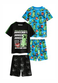 Minecraft-tema pyjamasæt med en sort skjorte med grafik og to par shorts, et blå med creepers og et sort med pixelerede designs.