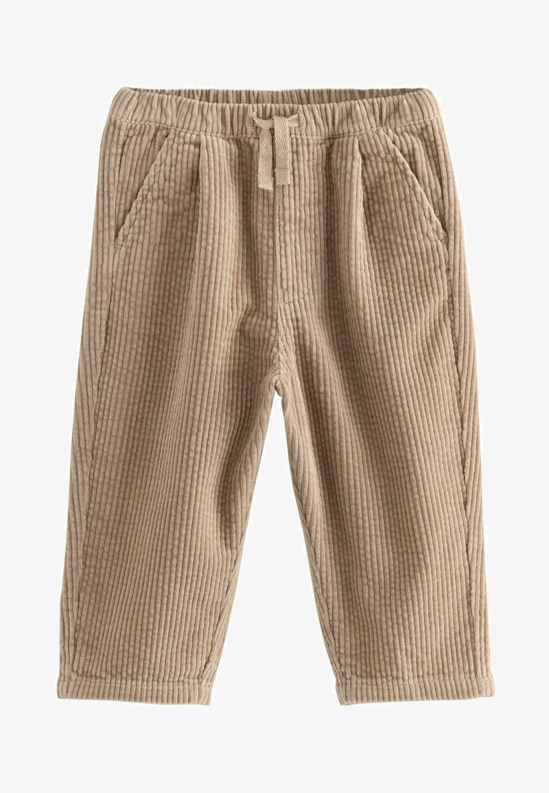 Pantalon en velours côtelé de couleur brun clair avec une texture à côtes verticales. Il dispose d'une taille élastique et de deux poches latérales.