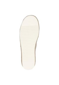 Suola della scarpa in gomma crema con motivi di grip testurizzati, circondata da uno strato di fibra naturale. Leggermente arrotondata all'estremità per una forma naturale.