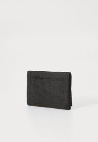 Black fabric wallet with a simple foldable design, featuring a textured surface and a single external card slot. Compact and rectangular shape.