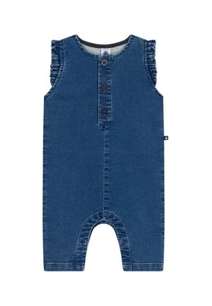 Combinaison bébé sans manches en denim bleu avec trois boutons sur le devant et épaules à volants, dotée d'un col rond et d'une étiquette sur le côté.
