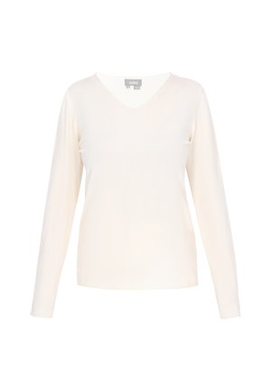 Hosszú ujjú, krémszínű V-nyakú felső puha anyagból. Szűk fazonú, sima tapintású, egyszerű dizájnnal és látható minták nélkül.