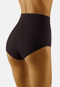 Shapewear alto in vita di colore nero, realizzato in tessuto liscio e elastico, con un design senza cuciture per il massimo comfort e una vestibilità aderente sui fianchi.