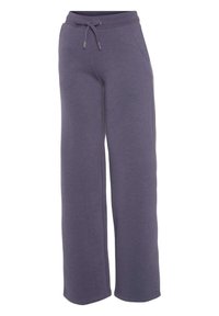 Paarse wijde sweatpants gemaakt van zachte stof, met een elastische tailleband en een trekkoord, en zijzakken.