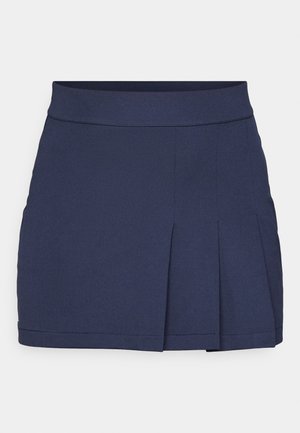 Tengerészkék, plisszírozott mini szoknya sima textúrával, derékpánttal és tiszta varrással. Egyszerű és funkcionális dizájn, amely alkalmas különböző eseményekre.