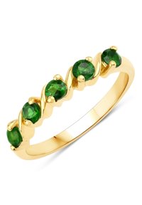 Bague en or ornée de cinq pierres précieuses vertes, à la conception ondulée. Fini lisse avec des accents polis. Forme circulaire, bande mince.