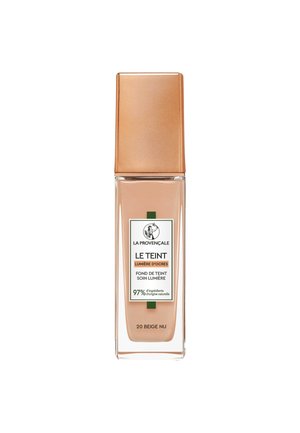 Bouteille de fond de teint La Provençale Le Teint en teinte 20 Beige Nu avec une couleur beige clair et un bouchon couleur cuivre.