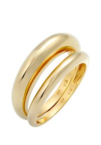 Goldfarbener Ring-Satz mit zwei ineinander greifenden Bändern: eines breit und glatt, das andere schmaler mit einer polierten Oberfläche und Innensymbolen.