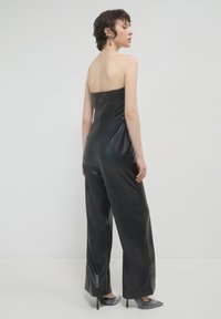 Calliope Tuta jumpsuit - nero