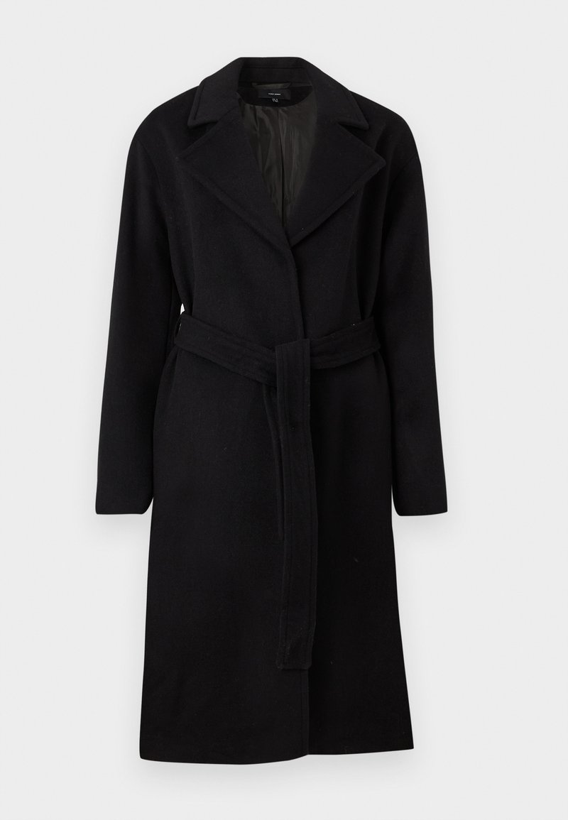 Svart ullkappa med slagkrage, långa ärmar och självbundna bälte. Har en slät textur och knälång design.