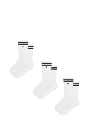 Drei Paar weiße Knöchelsocken mit schwarzen Doppelstreifen und einem kleinen schwarzen Logo nahe dem oberen Rand, angeordnet auf weißem Hintergrund.