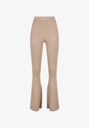 Beige ribbade knit-housut, joissa on korkea vyötärö ja levenevät lahkeet, suunniteltu muotoilemaan vartalon linjoja lantiolta ja reideltä.