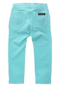 Türkise Leggings aus weichem, dehnbarem Material, ausgestattet mit zwei Gesäßtaschen und einem breiten Bund für zusätzlichen Komfort.