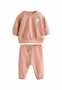Set di abbigliamento in cotone rosa composto da due pezzi, con una maglietta a maniche corte decorata con un motivo floreale e pantaloni con vita elasticizzata. Texture morbida, vestibilità comoda.