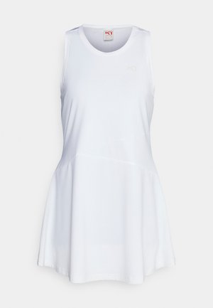 Bela atletska obleka brez rokavov z oprijetim korpusom in razširjenim krilom, ima okroglo izrez in gladko tkanino. Diskreten logotip na prsih.