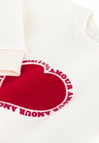 Petit Bateau BÉBÉ MOLLETON - Melegítőfelső - milk