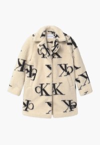 Cream faux fur coat with black CK logo pattern. Features a collar, button closure, and side pockets. Soft texture and mid-length design.