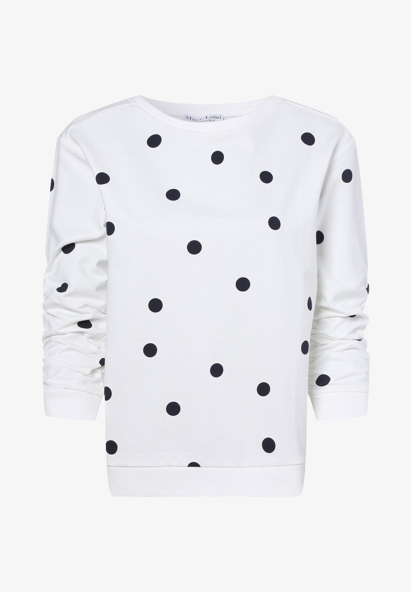 Sudadera blanca de manga larga, con un patrón de lunares negros. Cuello redondo, puños y dobladillo acanalados. Material suave de algodón.