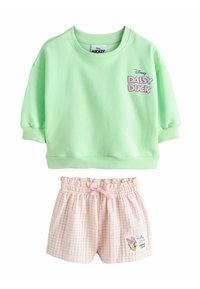 Menta zöld pamut pulóver kerek nyakkal és "Daisy Duck" grafikával. Rózsaszín kockás rövidnadrág gumis derékrésszel és masni díszítéssel.