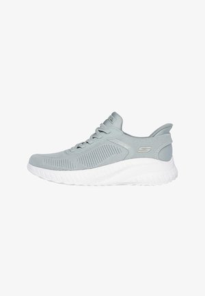 Light grey athletic shoe with a textured mesh upper, lace-up front, padded collar, and a white, ridged rubber sole for cushioning.