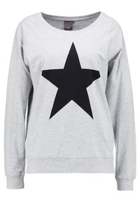 Sudadera gris claro hecha de un tejido suave que presenta un gran gráfico de estrella negra en la parte frontal. Los puños y el dobladillo tienen una textura de canalé.