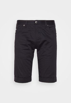 Juodi medvilniniai šortai su tiesiu pjaustymu, sukti kraštai, užtrauktukas ir diržo kilpos. Du šoniniai kišeniai ir vienas galinis kišenys laikymui.