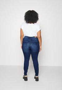 Vero Moda Curve VMTANYA CURVE HIGH WAIST - Jegging - dark blue denim