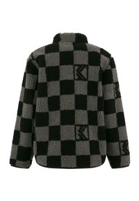 Svart och grått rutigt fleecejacka med hög krage, texturerad tyg och präglade logodetaljer på baksidan. Mjuk, varm material.