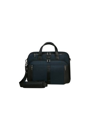 Schwarze und marineblaue Stoff-Umhängetasche mit zwei oberen Griffen, verstellbarem Riemen, mehreren Reißverschlussfächern und eleganten Designelementen.