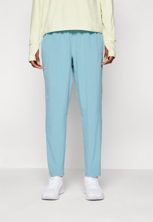 DRI-FIT FAST - Tepláky - denim turquoise/silver