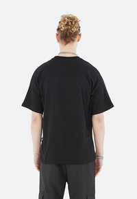 Megaman Print T-shirt - schwarz