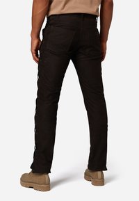 Ricano Leren broek - braun