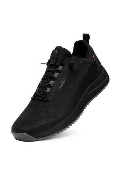 Black athletic shoes with a mesh upper, textured detailing, elastic laces, and a rubber outsole for traction. Features a pull tab on the heel.