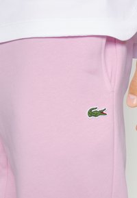 Lacoste CLASSIC - Calças de fato de treino - rose