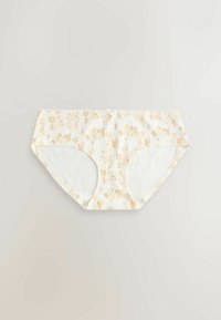 Culotte hipster pour femme blanche avec des motifs botaniques et abstraits en lignes orange clair, posée à plat sur un fond neutre.