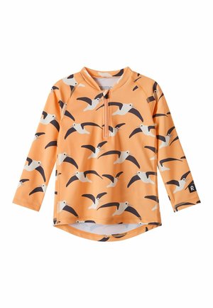 Oranges Kinderoberteil mit langen Ärmeln, weißem und schwarzem Möwenmuster und kurzem Frontreißverschluss.