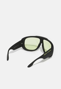 Armani Exchange Päikeseprillid - matte black/light green