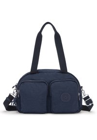 Borsa in tessuto blu navy con due tasche frontali con zip, tracolla regolabile, manici superiori e un'etichetta rotonda con logo. Texture liscia e forma arrotondata.