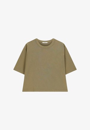 Olijfgroene oversized t-shirt van katoen, met korte mouwen, een ronde hals en een cropped zoom voor een ontspannen pasvorm.